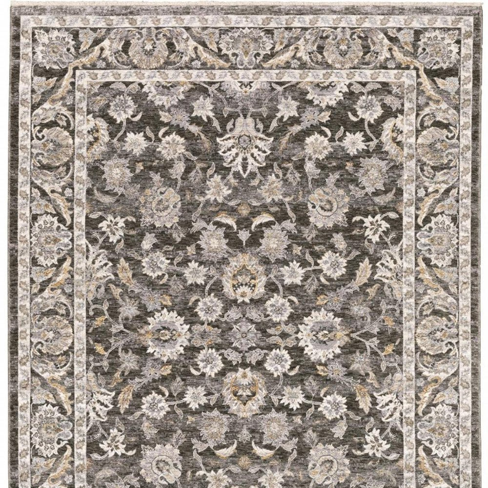 5' X 8' Grey And Ivory Oriental Power Loom Stain Resistant Area Rug With Fringe