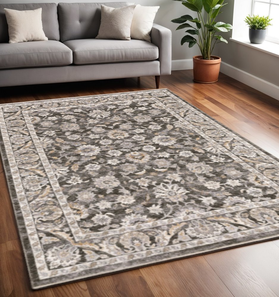 5' X 8' Grey And Ivory Oriental Power Loom Stain Resistant Area Rug With Fringe