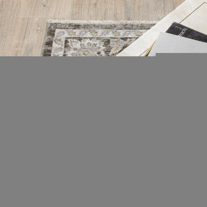 10' X 13' Grey And Ivory Oriental Power Loom Stain Resistant Area Rug With Fringe