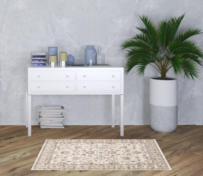 3' X 5' Ivory And Grey Oriental Power Loom Stain Resistant Area Rug With Fringe