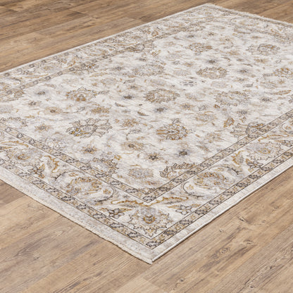 6' X 9' Ivory And Grey Oriental Power Loom Stain Resistant Area Rug With Fringe