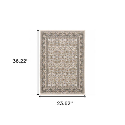 2' X 3' Ivory And Grey Oriental Power Loom Stain Resistant Area Rug With Fringe