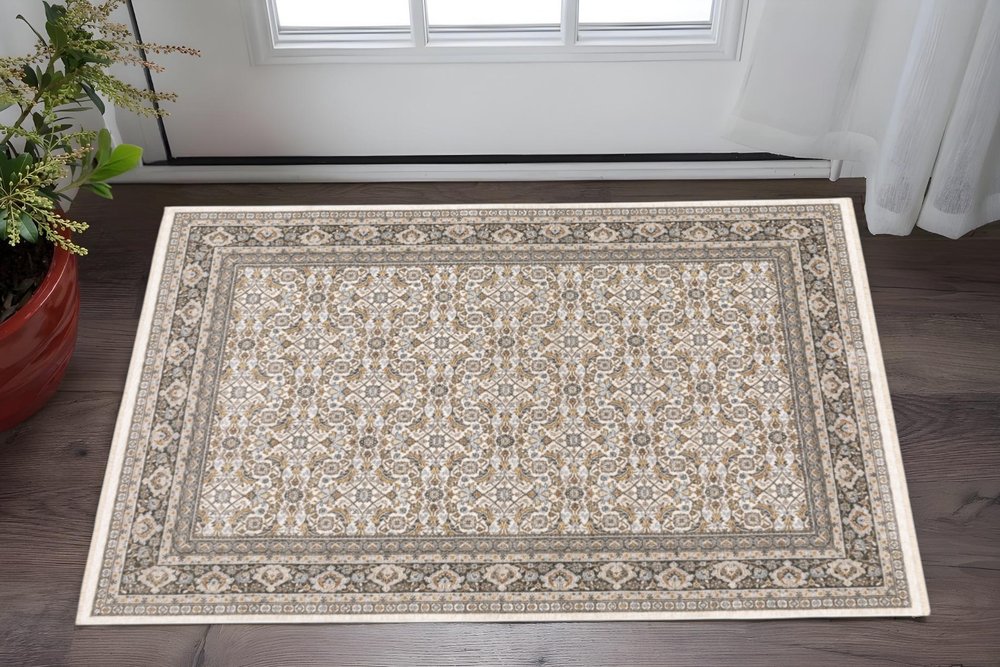 2' X 3' Ivory And Grey Oriental Power Loom Stain Resistant Area Rug With Fringe