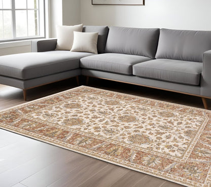 7' X 10' Ivory And Rust Oriental Area Rug With Fringe