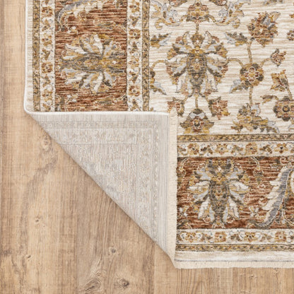7' X 10' Ivory And Rust Oriental Area Rug With Fringe