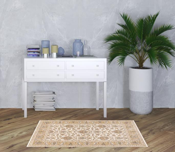 3' X 5' Ivory And Gold Oriental Power Loom Stain Resistant Area Rug With Fringe