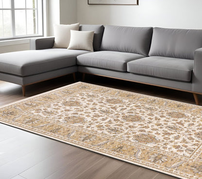 7' X 10' Ivory And Gold Oriental Area Rug With Fringe