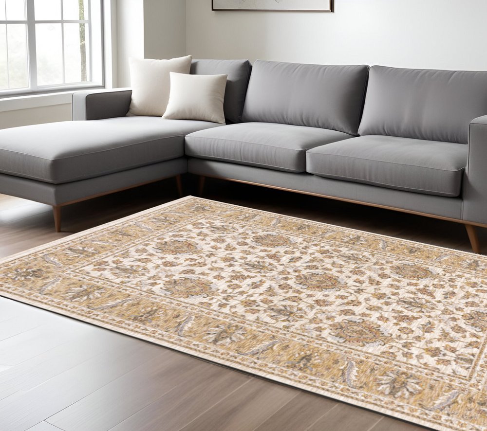 10' X 13' Ivory And Gold Oriental Area Rug With Fringe