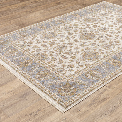 3' X 5' Ivory And Blue Oriental Power Loom Stain Resistant Area Rug With Fringe