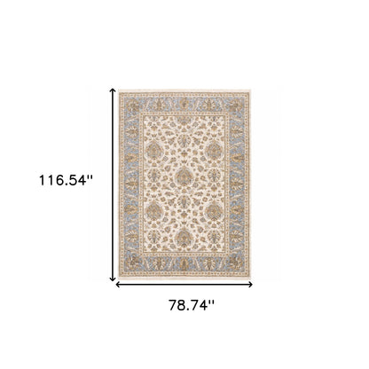 6' X 9' Ivory And Blue Oriental Power Loom Stain Resistant Area Rug With Fringe