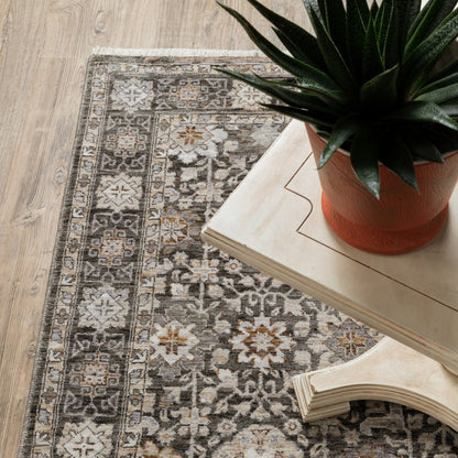 5' X 8' Charcoal And Ivory Oriental Area Rug With Fringe
