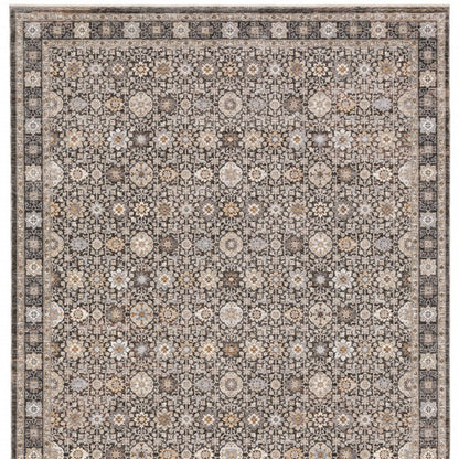 8' X 11' Charcoal Ivory and Beige Floral Power Loom Area Rug With Fringe