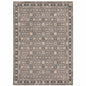 8' X 11' Charcoal Ivory and Beige Floral Power Loom Area Rug With Fringe