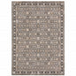 8' X 11' Charcoal Ivory and Beige Floral Power Loom Area Rug With Fringe
