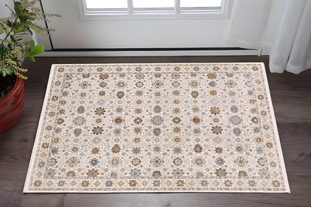2' X 3' Ivory And Gold Oriental Power Loom Stain Resistant Area Rug With Fringe