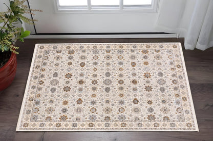 3' X 5' Ivory And Gold Oriental Power Loom Stain Resistant Area Rug With Fringe