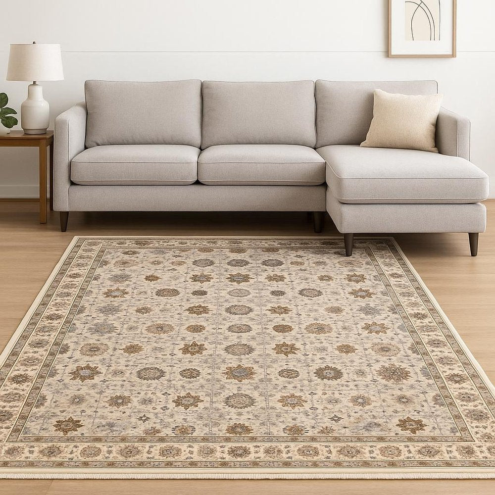 6' X 9' Ivory And Gold Oriental Power Loom Stain Resistant Area Rug With Fringe