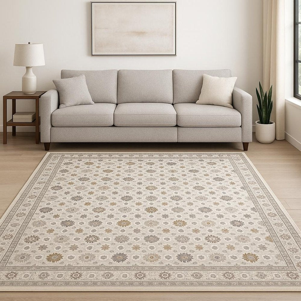 8' X 11' Ivory And Gold Oriental Power Loom Stain Resistant Area Rug With Fringe