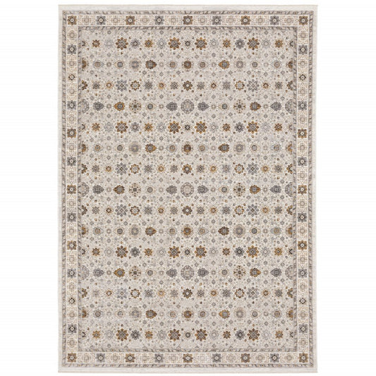 8' X 11' Ivory And Gold Oriental Power Loom Stain Resistant Area Rug With Fringe