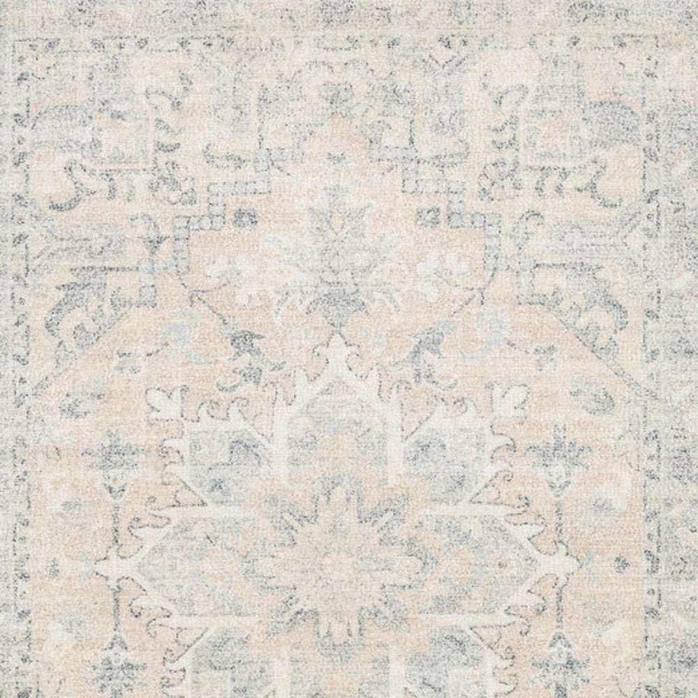 5' X 8' Beige And Grey Oriental Hand Loomed Stain Resistant Area Rug With Fringe