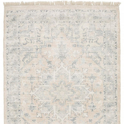 5' X 8' Beige And Grey Oriental Hand Loomed Stain Resistant Area Rug With Fringe