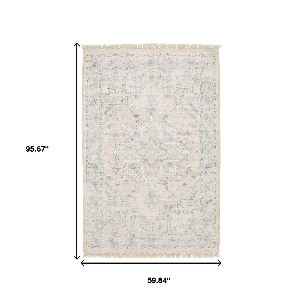 5' X 8' Beige And Grey Oriental Hand Loomed Stain Resistant Area Rug With Fringe