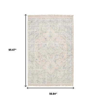 5' X 8' Beige And Grey Oriental Hand Loomed Stain Resistant Area Rug With Fringe