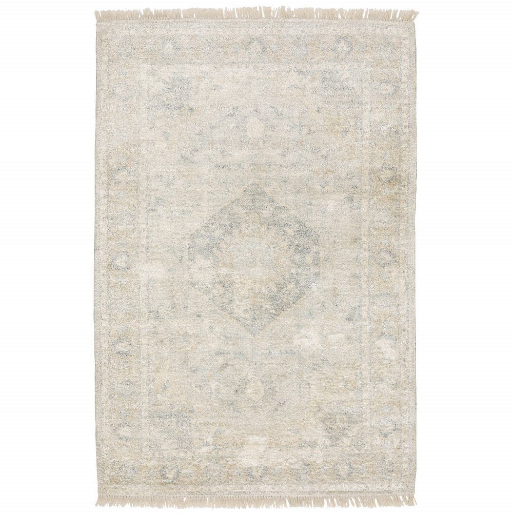 5' X 8' Beige And Grey Oriental Hand Loomed Stain Resistant Area Rug With Fringe