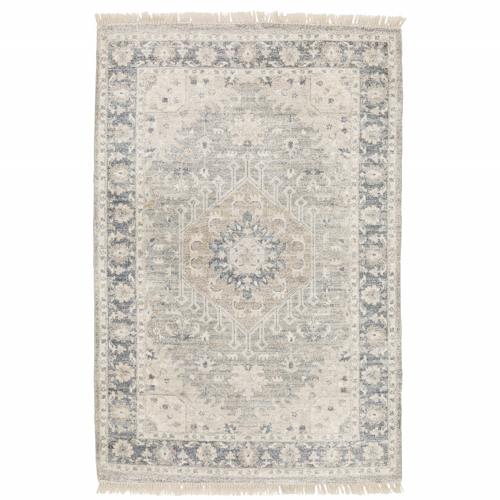 5' X 8' Beige And Grey Oriental Hand Loomed Stain Resistant Area Rug With Fringe