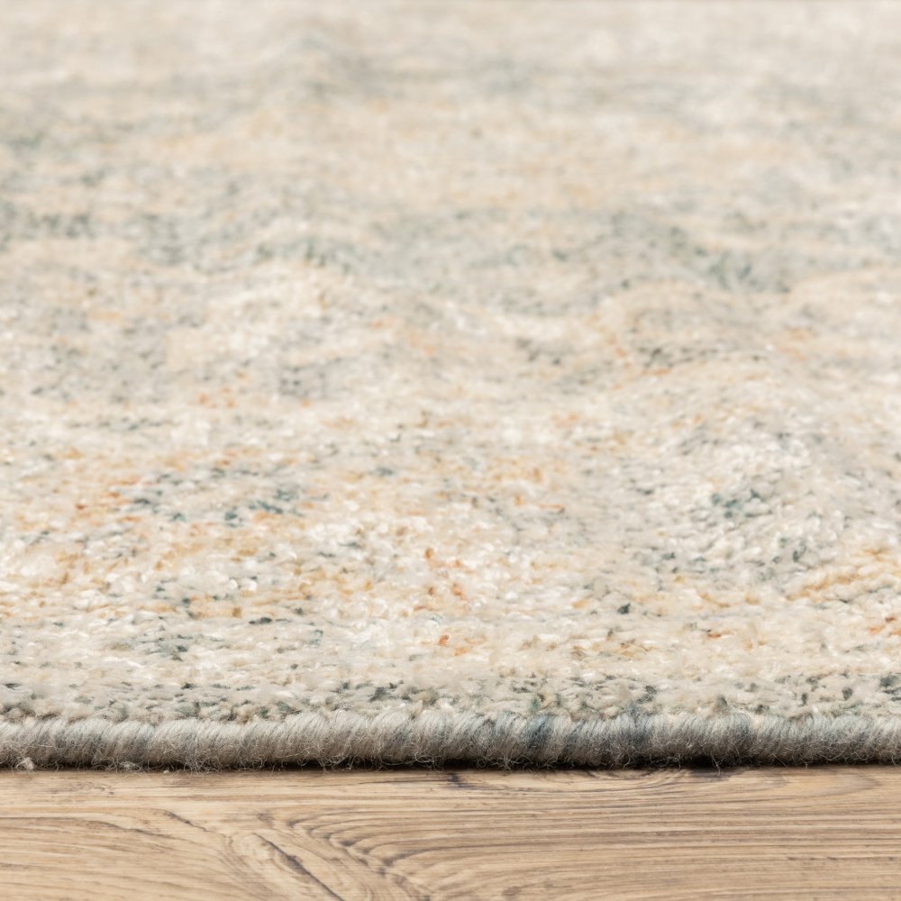 5' X 8' Grey And Beige Oriental Hand Loomed Stain Resistant Area Rug With Fringe