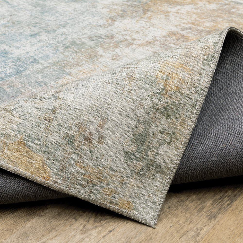 9' X 12' Yellow And Blue Abstract Area Rug