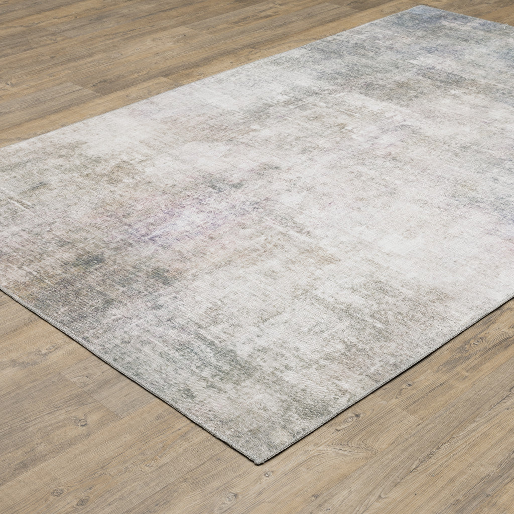 5' X 7' Beige Blue Grey Green Brown And Purple Abstract Power Loom Stain Resistant Area Rug