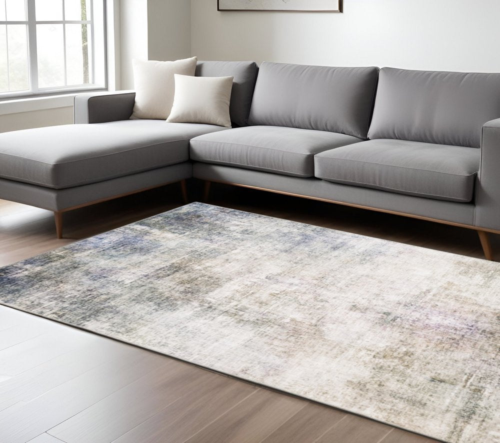 9' X 12' Blue And Beige Abstract Distressed Area Rug