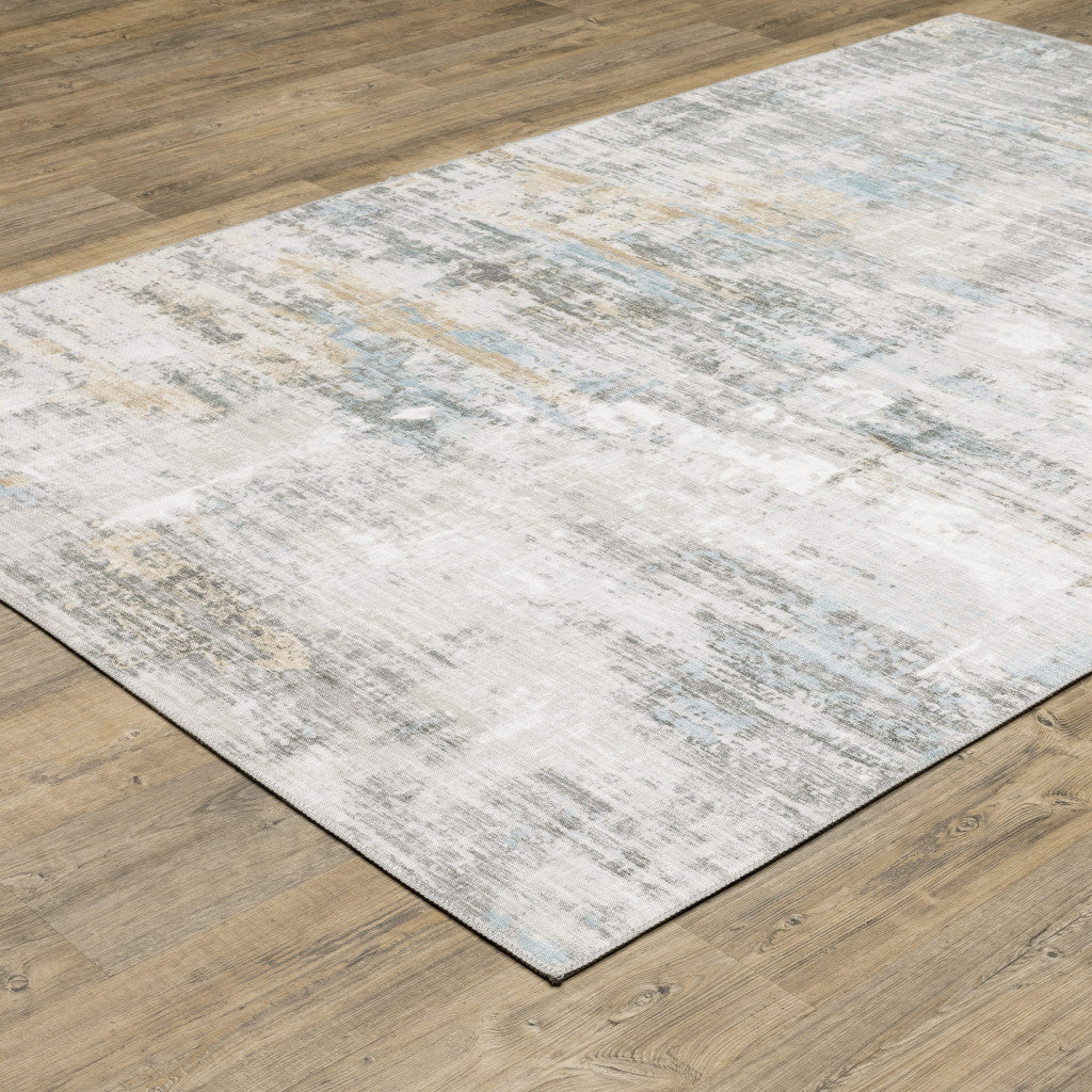 5' X 7' Gray And Ivory Abstract Power Loom Stain Resistant Area Rug