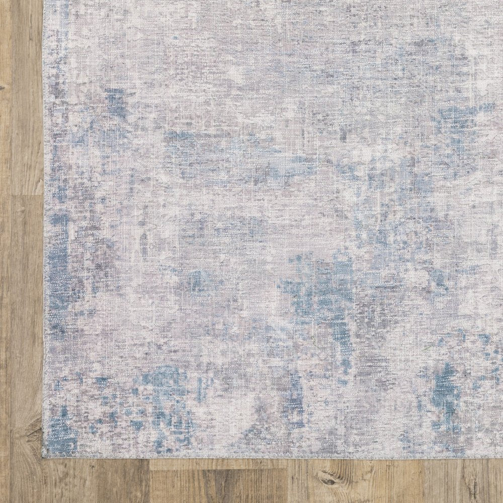 9' X 12' Blue And Gray Abstract Distressed Area Rug