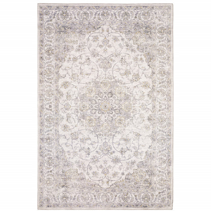 5' X 7' Beige Gold And Grey Oriental Power Loom Stain Resistant Area Rug