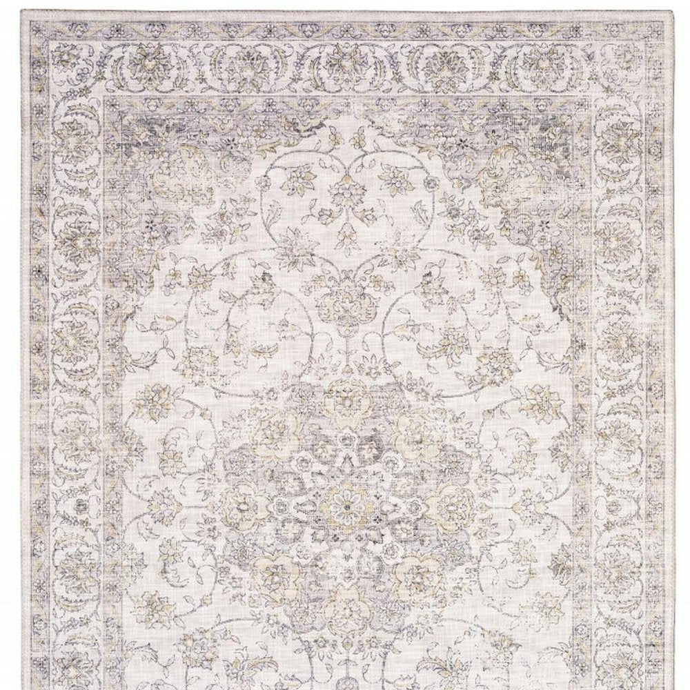 5' X 7' Beige Gold And Grey Oriental Power Loom Stain Resistant Area Rug