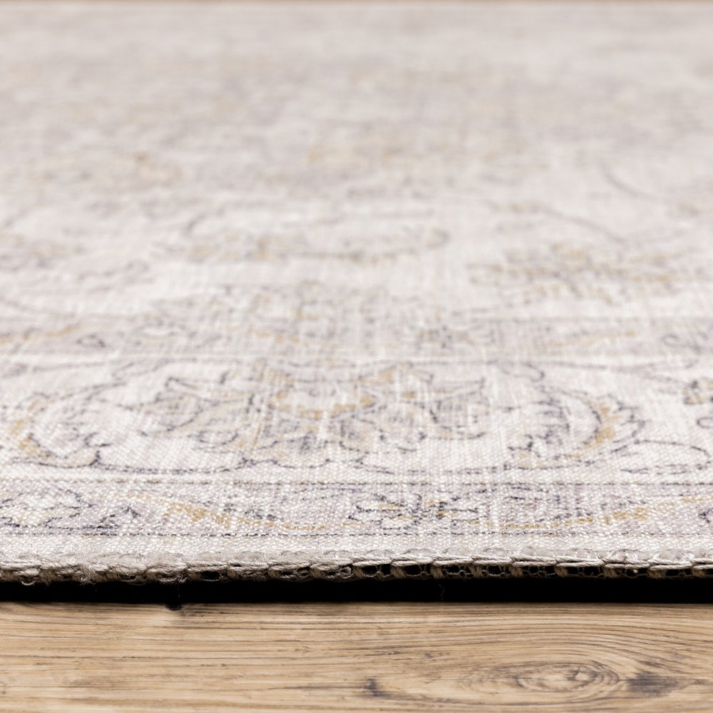 8' X 10' Beige And Gold Oriental Distressed Area Rug