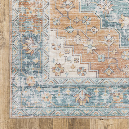 5' X 7' Orange Blue Teal Green And Beige Oriental Power Loom Stain Resistant Area Rug