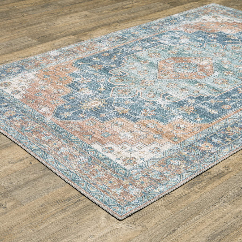 8' X 10' Orange Blue Teal Green And Beige Oriental Power Loom Stain Resistant Area Rug