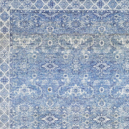 5' X 7' Blue And Grey Oriental Power Loom Stain Resistant Area Rug