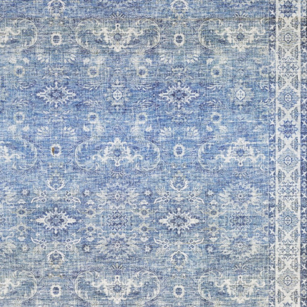 9' X 12' Blue And Ivory Oriental Distressed Area Rug