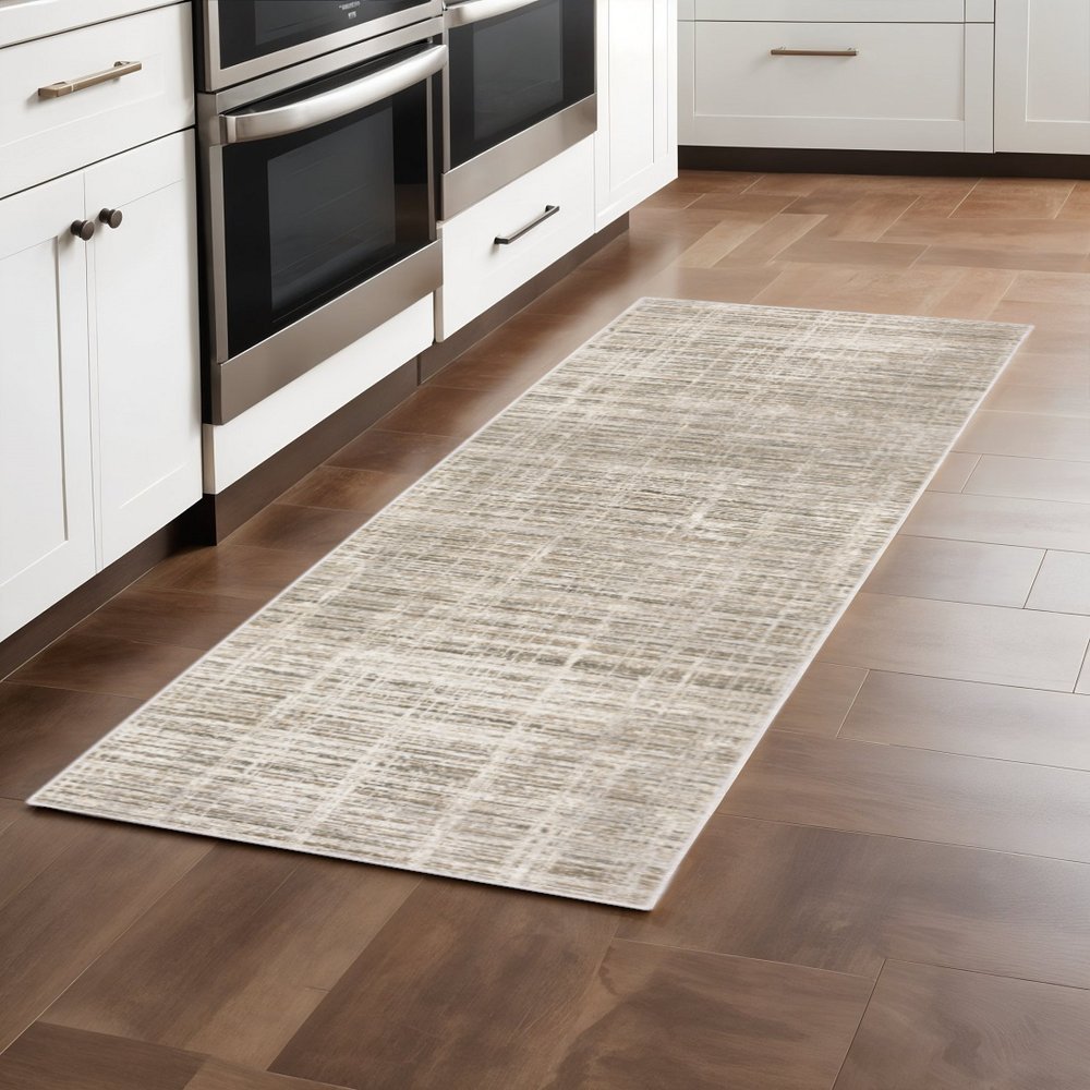 2' X 8' Beige Grey Ivory Tan And Brown Abstract Power Loom Stain Resistant Runner Rug