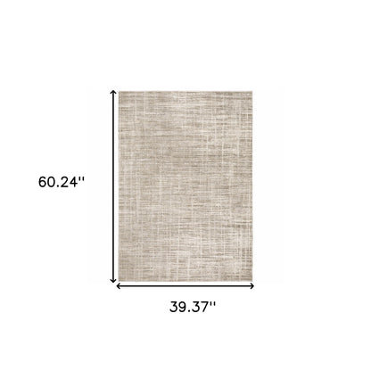 3' X 5' Beige Grey Ivory Tan And Brown Abstract Power Loom Stain Resistant Area Rug