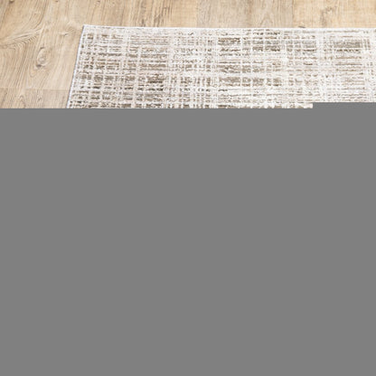 5' X 8' Beige Grey Ivory Tan And Brown Abstract Power Loom Stain Resistant Area Rug