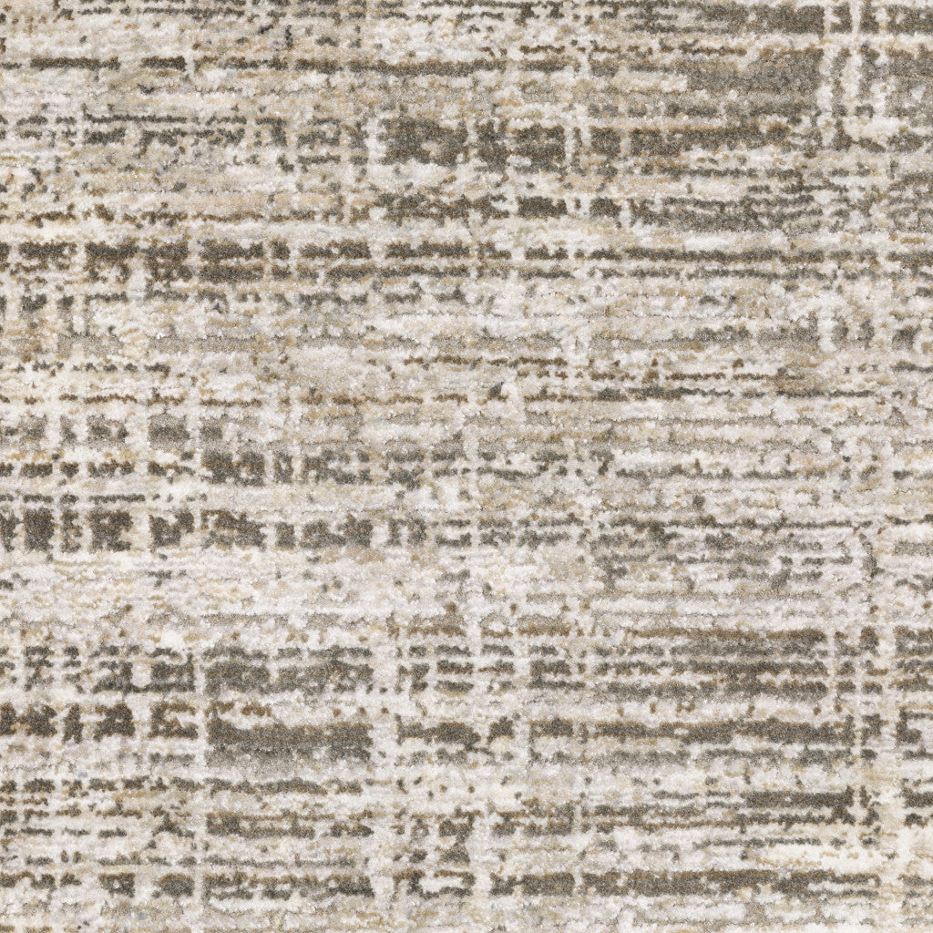 5' X 8' Beige Grey Ivory Tan And Brown Abstract Power Loom Stain Resistant Area Rug