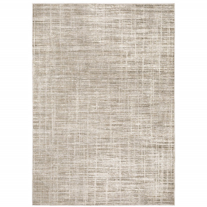 6' X 9' Beige Grey Ivory Tan And Brown Abstract Power Loom Stain Resistant Area Rug