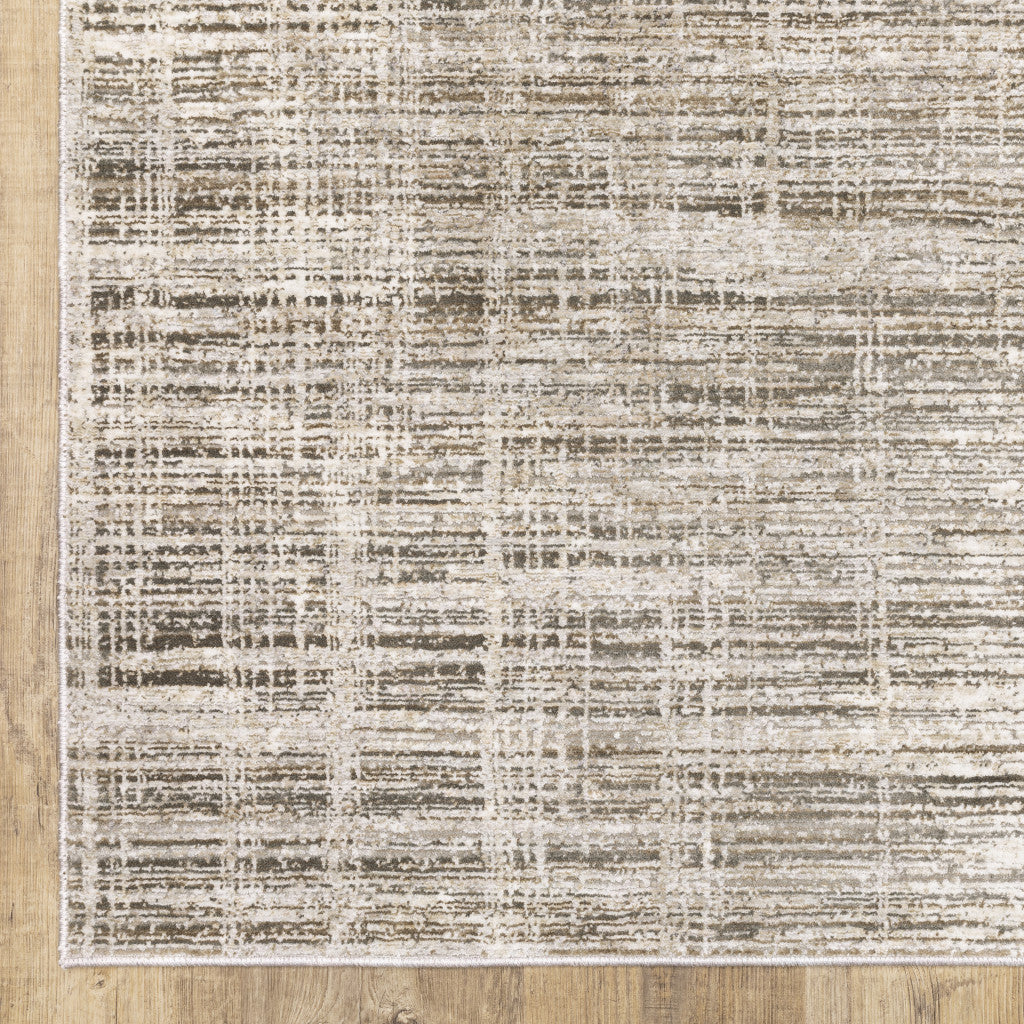 8' X 11' Beige Grey Ivory Tan And Brown Abstract Power Loom Stain Resistant Area Rug