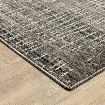 2' X 8' Charcoal Grey Grey Ivory Tan And Brown Abstract Power Loom Stain Resistant Runner Rug