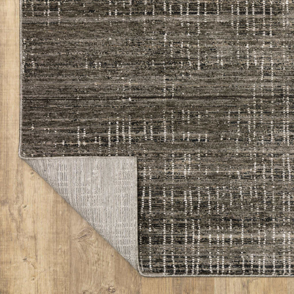 2' X 8' Charcoal Grey Grey Ivory Tan And Brown Abstract Power Loom Stain Resistant Runner Rug